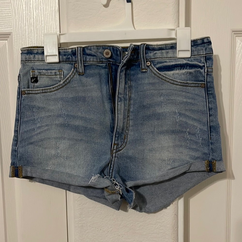 Womens large kancan denims shorts with distressed hem.